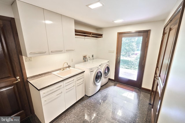 174 Springhouse Ln, Spring Grove, PA 17362 - laundry area with cabinet space, independent washer and dryer, granite tiled floors, and baseboards