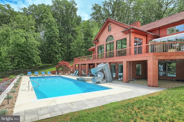 174 Springhouse Ln, Spring Grove, PA 17362 - view of pool featuring a water slide, a patio, and a deck