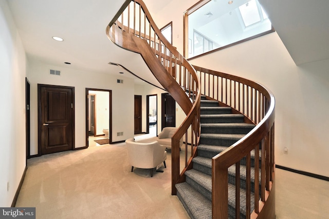 174 Springhouse Ln, Spring Grove, PA 17362 - stairs featuring carpet, baseboards, recessed lighting, and a skylight