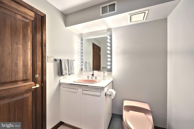 174 Springhouse Ln, Spring Grove, PA 17362 - half bath featuring toilet, vanity, and baseboards