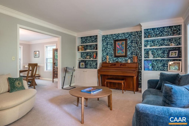 sitting room featuring crown molding, baseboards, and carpet flooring