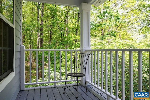 deck with a wooded view