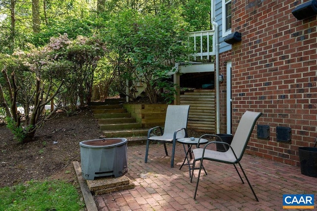 view of patio featuring stairway