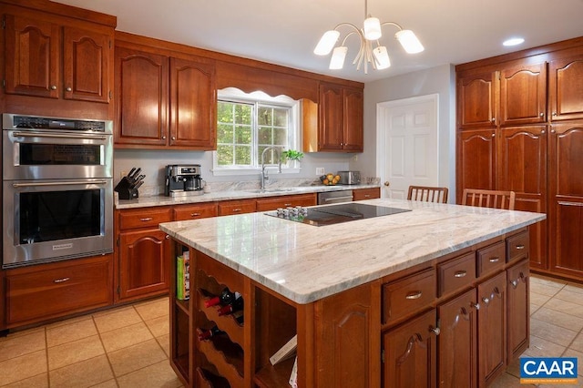 kitchen featuring open shelves, a kitchen island, a sink, light tile patterned floors, and stainless steel appliances