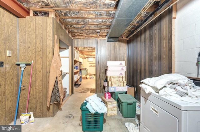 unfinished basement featuring washer / dryer