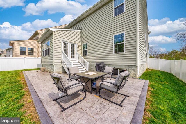 view of patio / terrace with a fenced backyard and entry steps