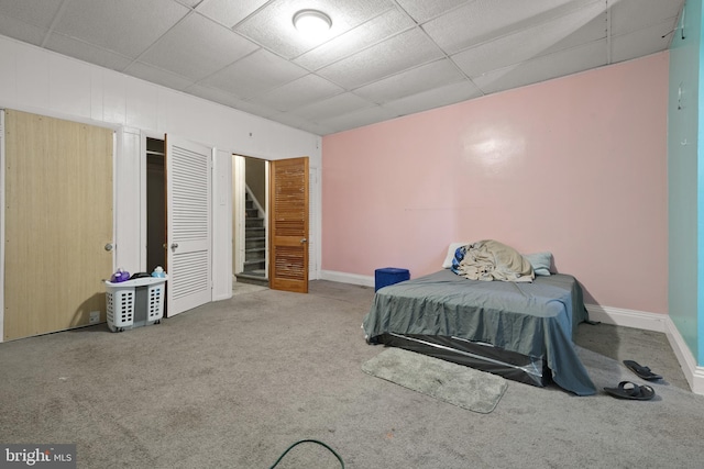 662 Linden Ave, York, PA 17404 - carpeted bedroom with baseboards and a drop ceiling