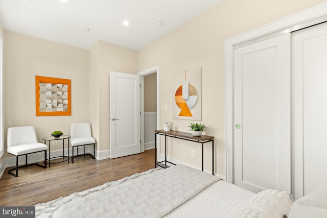 bedroom featuring recessed lighting, baseboards, and wood finished floors