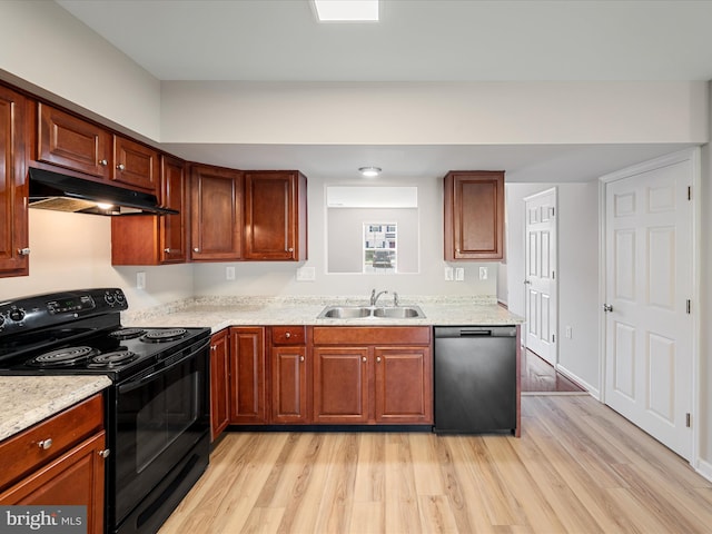 119 Checko Ct, Martinsburg, WV 25401 - kitchen with light wood-type flooring, under cabinet range hood, black electric range, a sink, and dishwasher