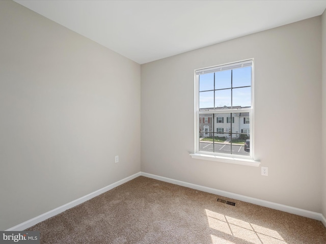119 Checko Ct, Martinsburg, WV 25401 - carpeted spare room with visible vents and baseboards