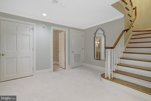 foyer entrance featuring visible vents, stairs, baseboards, recessed lighting, and carpet flooring