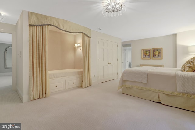 bedroom featuring baseboards, carpet, a closet, and visible vents
