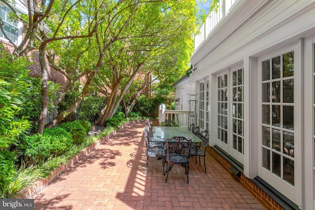 view of patio / terrace with french doors and outdoor dining area