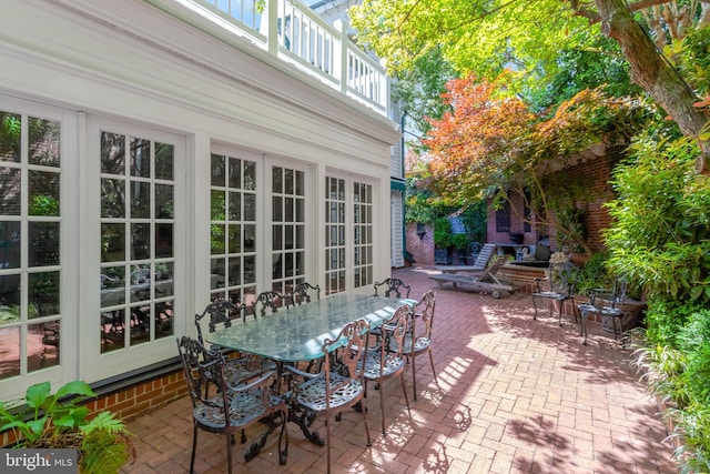 view of patio featuring french doors and outdoor dining space