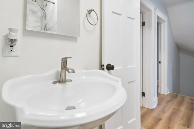 216 Homewood Ter, Baltimore, MD 21218 - bathroom with a sink and wood finished floors