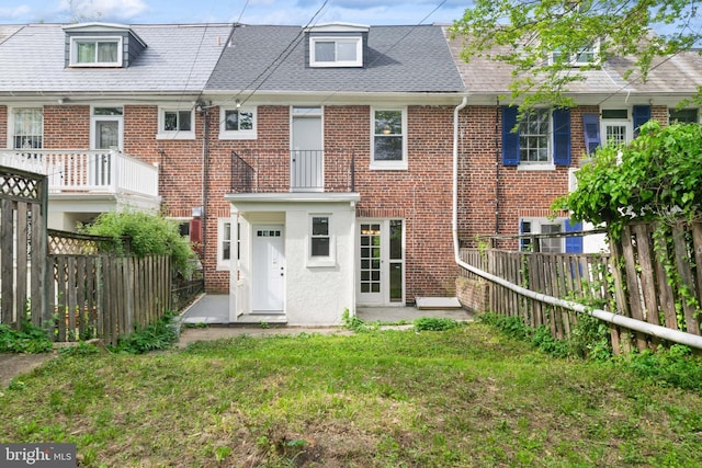 216 Homewood Ter, Baltimore, MD 21218 - rear view of house featuring brick siding