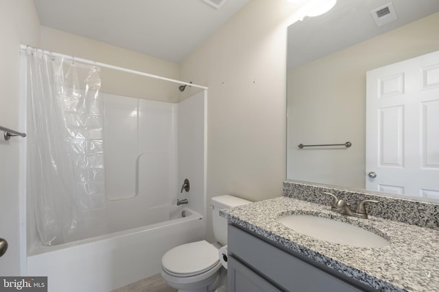 bathroom with vanity, shower / bath combination with curtain, toilet, and visible vents