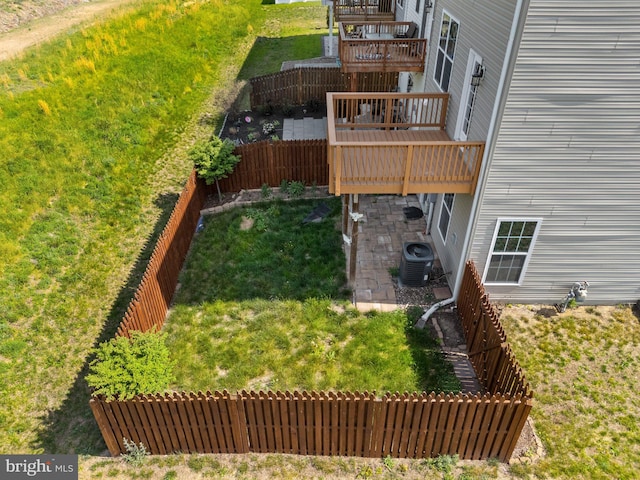 exterior space featuring central air condition unit, a fenced backyard, and a deck