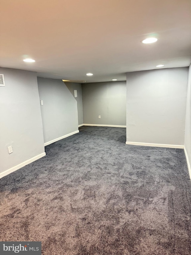 2526 W Franklin St, Baltimore, MD 21223 - finished below grade area with dark colored carpet, recessed lighting, baseboards, and visible vents