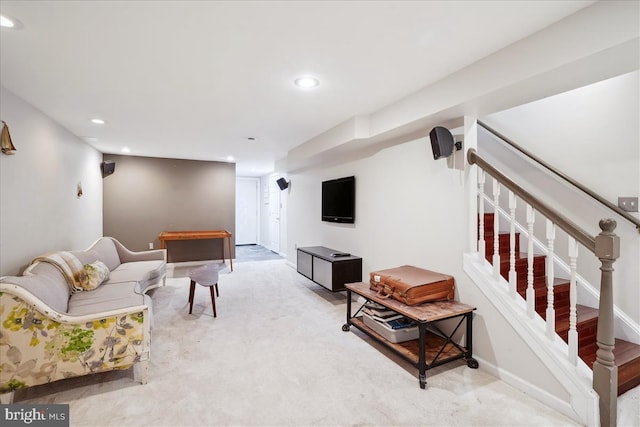 carpeted living room featuring recessed lighting, stairs, and baseboards