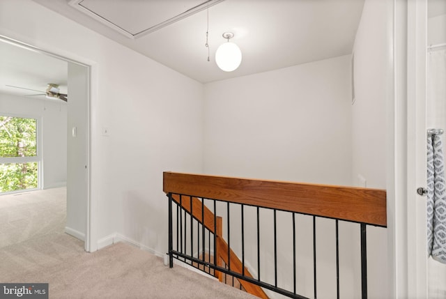 11645 Newbridge Ct, Reston, VA 20191 - hallway featuring attic access, an upstairs landing, carpet floors, and baseboards