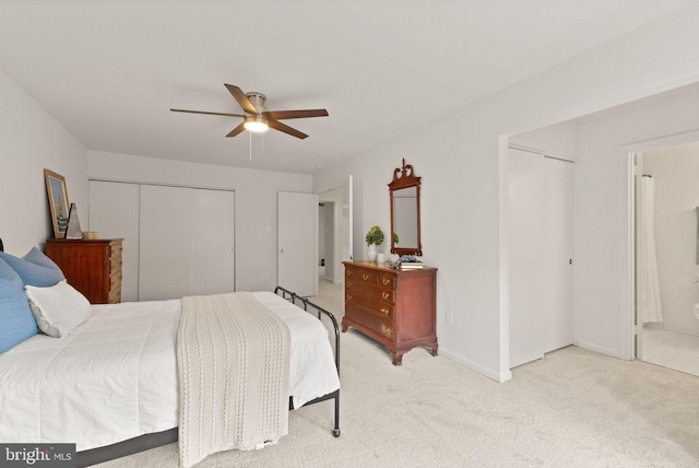 11645 Newbridge Ct, Reston, VA 20191 - bedroom featuring carpet flooring, ensuite bath, a ceiling fan, a closet, and baseboards