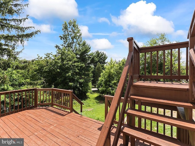 14 Featherbed Ln, Norristown, PA 19403 - wooden deck featuring a lawn