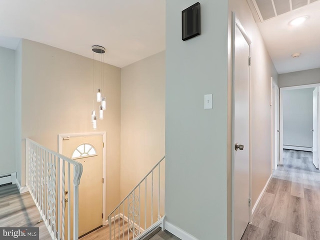 14 Featherbed Ln, Norristown, PA 19403 - interior space with baseboards, a baseboard radiator, and wood finished floors