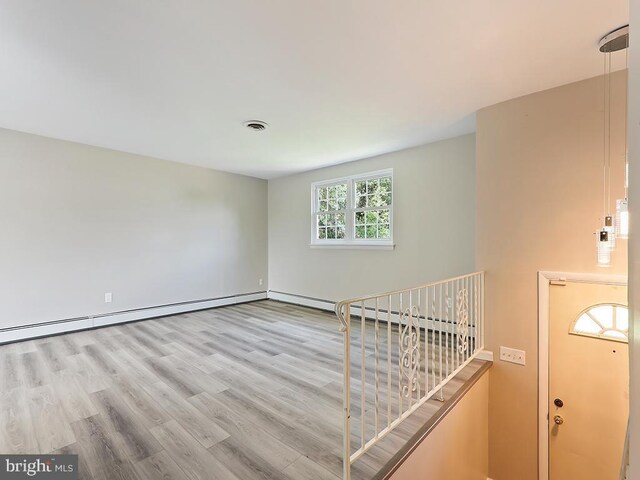 14 Featherbed Ln, Norristown, PA 19403 - empty room featuring baseboards, visible vents, and wood finished floors