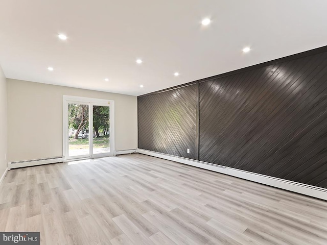 14 Featherbed Ln, Norristown, PA 19403 - empty room with baseboards, light wood-type flooring, recessed lighting, a baseboard heating unit, and a baseboard radiator