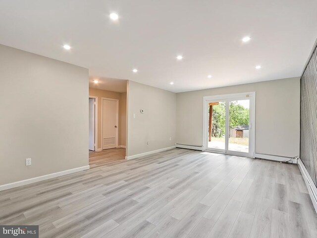 14 Featherbed Ln, Norristown, PA 19403 - spare room featuring recessed lighting, baseboards, baseboard heating, and light wood-style floors