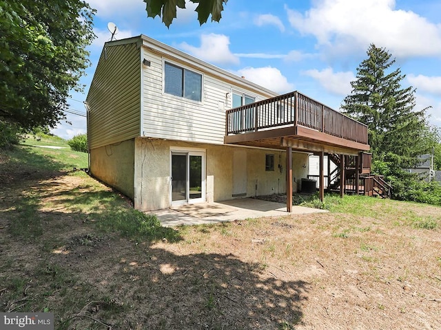 14 Featherbed Ln, Norristown, PA 19403 - rear view of house with stairway, a patio, and a wooden deck