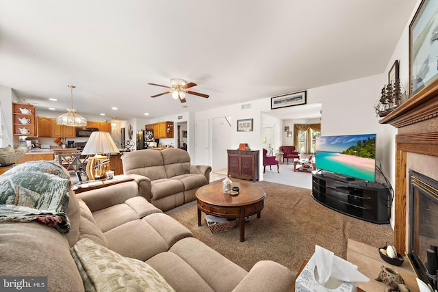 191 Willets Ave, Little Egg Harbor Twp, NJ 08087 - living area featuring light colored carpet, a glass covered fireplace, ceiling fan with notable chandelier, recessed lighting, and visible vents