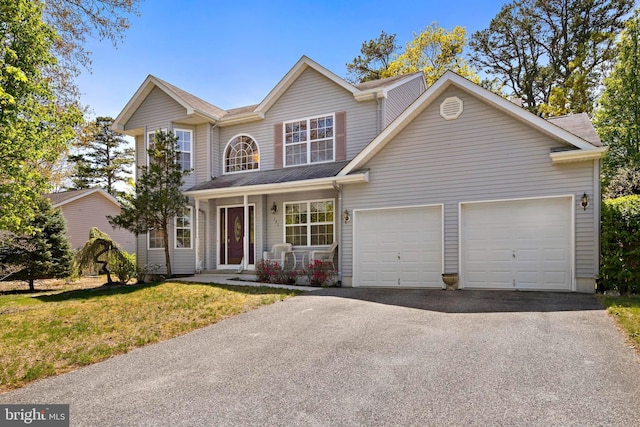 191 Willets Ave, Little Egg Harbor Twp, NJ 08087 - traditional-style home with a garage, covered porch, driveway, and a front yard