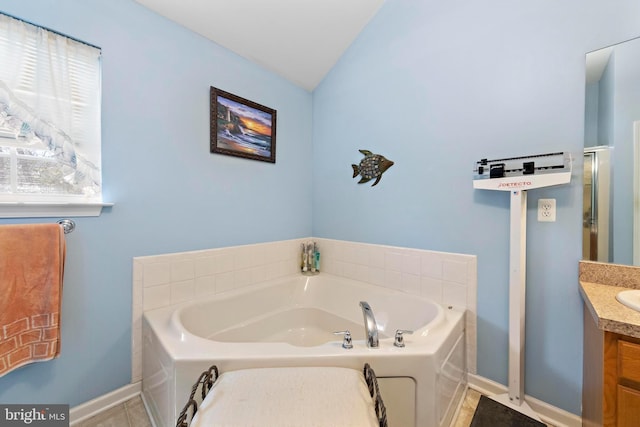 191 Willets Ave, Little Egg Harbor Twp, NJ 08087 - full bath with baseboards, vaulted ceiling, a garden tub, and vanity