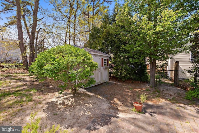 191 Willets Ave, Little Egg Harbor Twp, NJ 08087 - view of yard featuring fence, an outdoor structure, and a storage unit