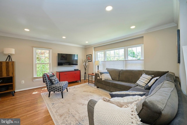 living area featuring recessed lighting, a wealth of natural light, and light wood-style flooring