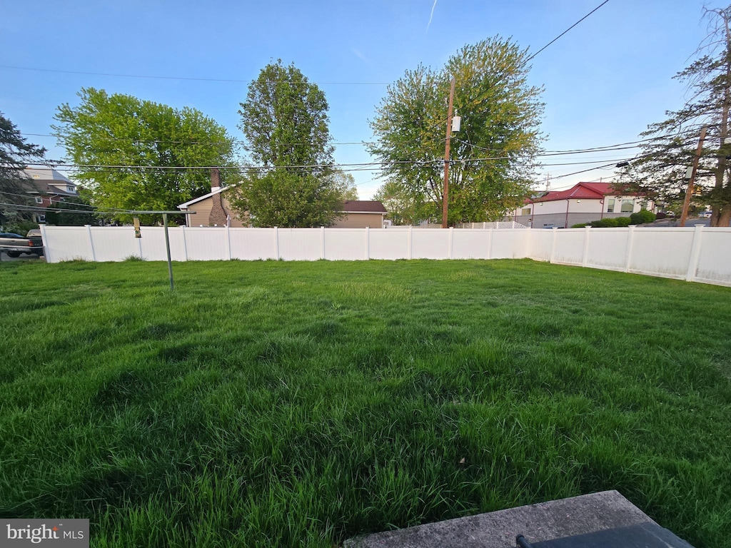 view of yard featuring fence