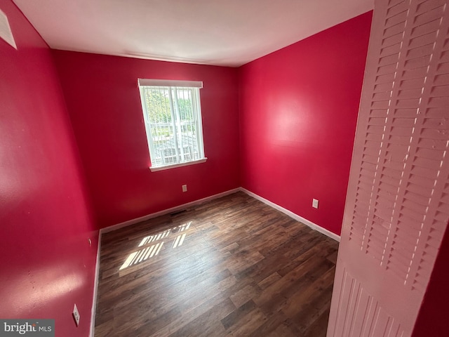 465 Barrister Pl, Dover, DE 19901 - unfurnished room with baseboards and wood finished floors