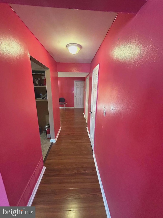 465 Barrister Pl, Dover, DE 19901 - hallway featuring baseboards and wood finished floors