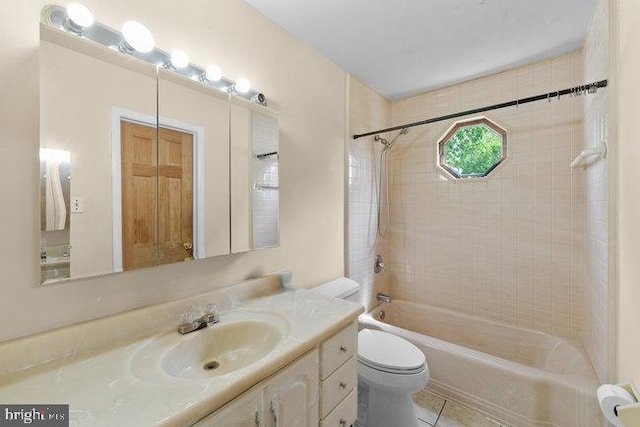 bathroom with toilet, shower / bath combination, tile patterned flooring, and vanity