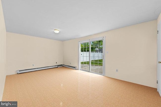 spare room featuring a baseboard radiator