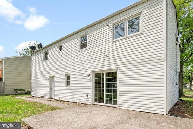 rear view of property with a patio area