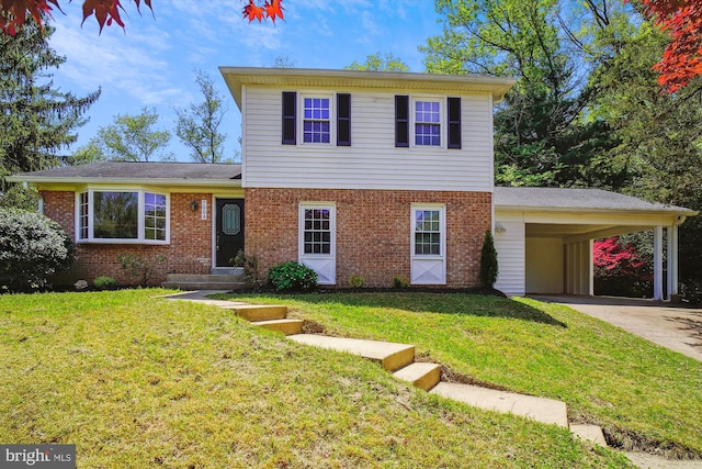 view of front facade with brick siding, a front lawn, driveway, and a carport