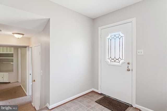 foyer with baseboards