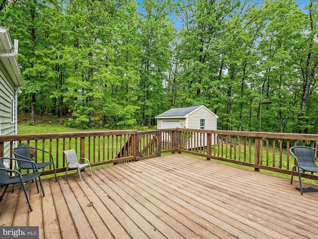 554 Wispy Branch Ln, Hedgesville, WV 25427 - wooden terrace with an outdoor structure, a garage, and a yard