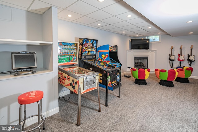 recreation room with baseboards, carpet, and recessed lighting