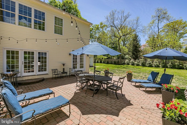 view of patio / terrace with french doors and outdoor dining space