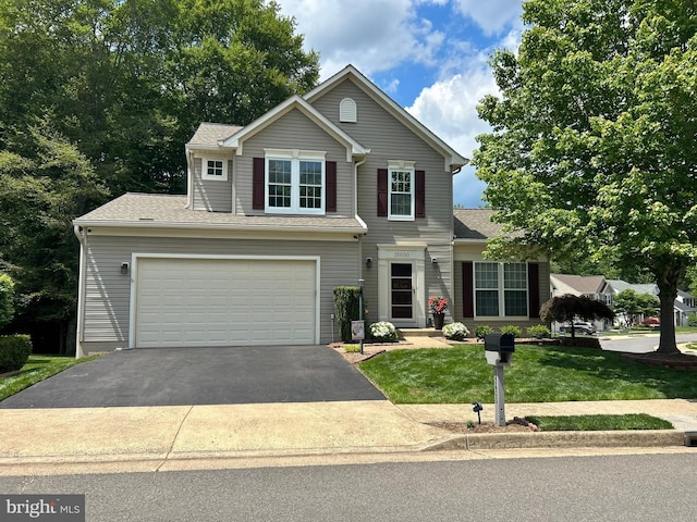 15600 Catrock Sluice Way, Manassas, VA 20112 - traditional home featuring driveway, a front yard, and an attached garage