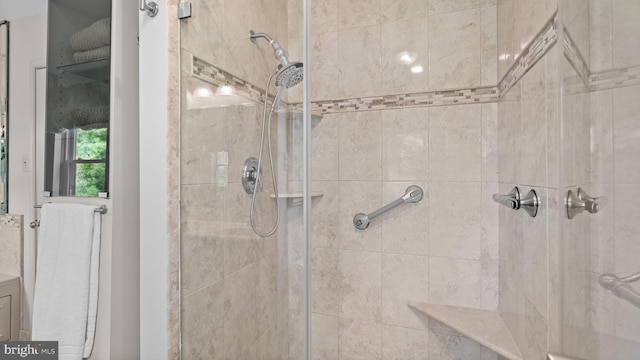 bathroom with a stall shower